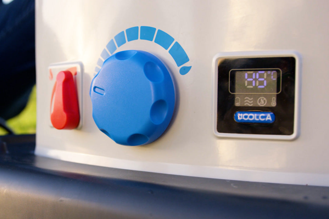 Close-up of the HOTTAP V2 red gas switch, blue temperature dial and digital display